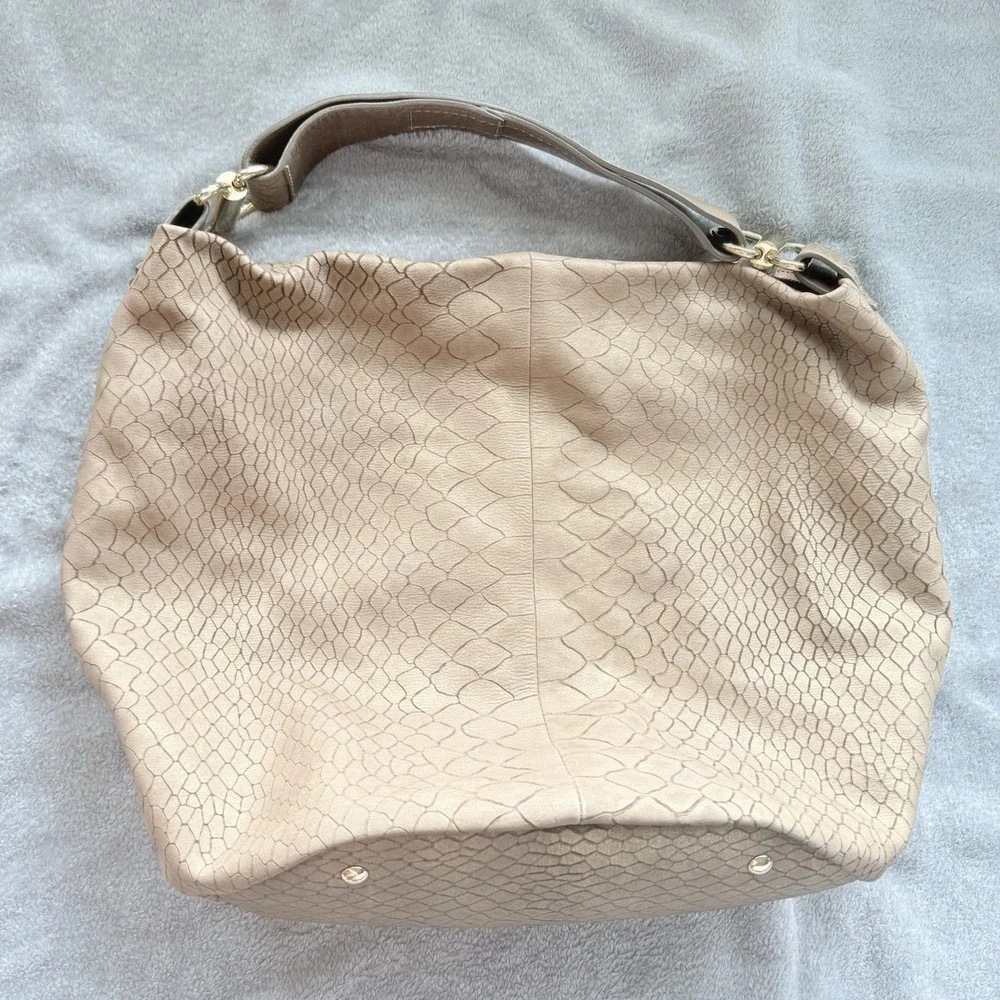 Coccinelle stylish neutral adds